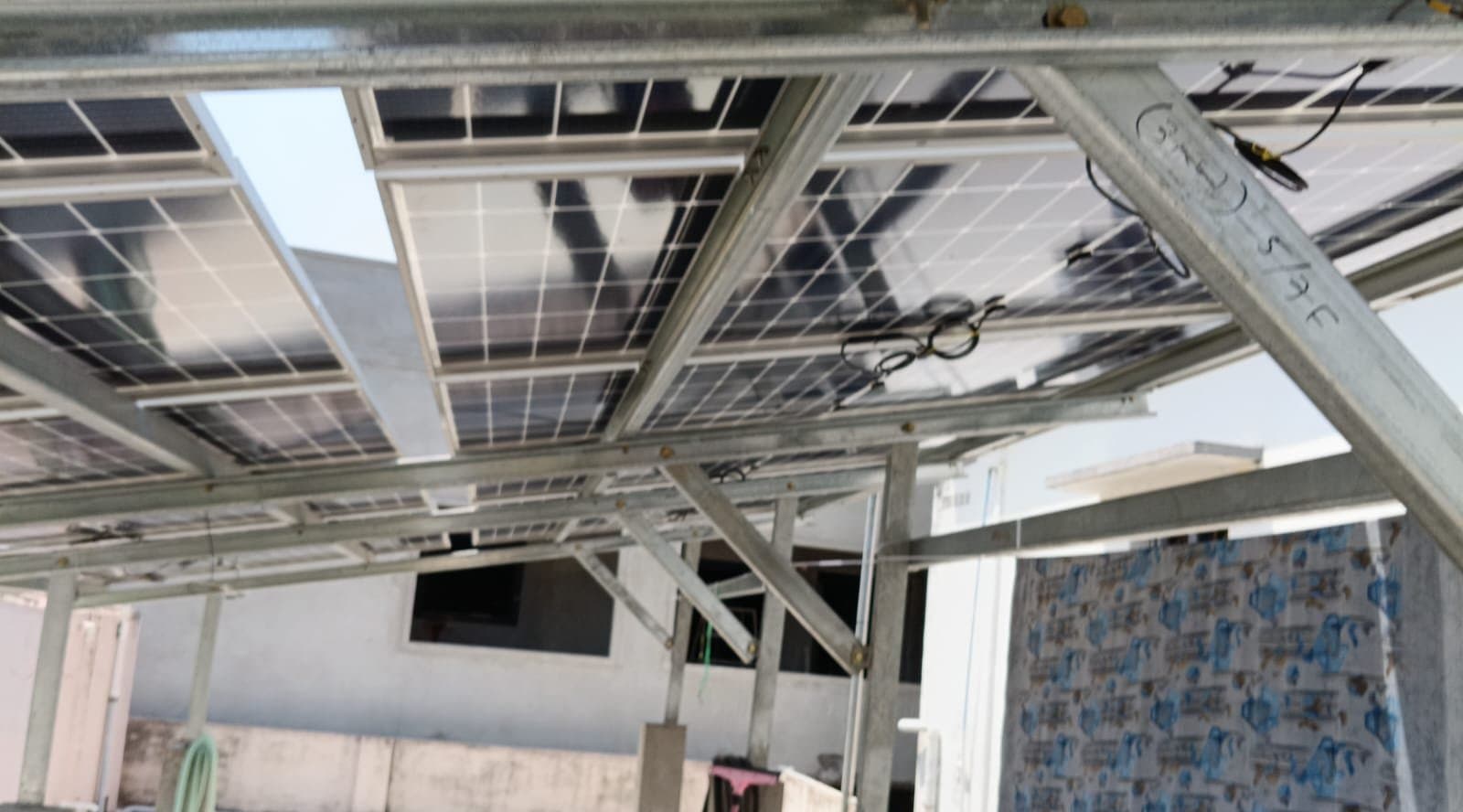 Elevated steel mounting structure under a SolarTech array